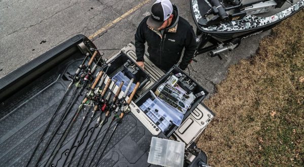 Truck with DECKED CargoGlide slide and DECKED drawers give fisherman easy access to rods and gear.