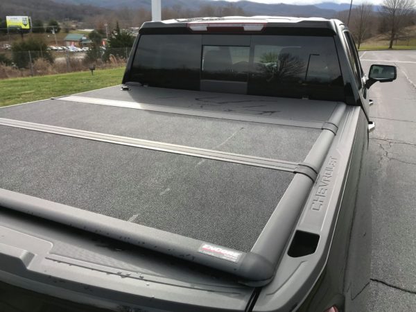 Extang Encore Foldable Bed Cover on Silver Chevy Truck