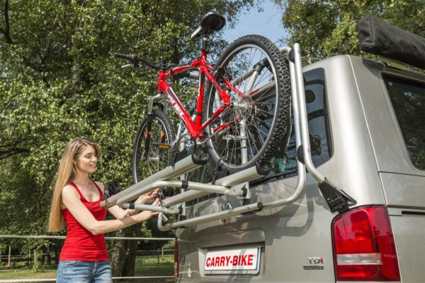Securing bicycle to Fiamma Carry-Bike rack mounted on rear of VW TDI camper van.