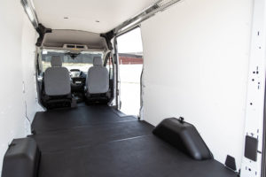 Cargo van interior with new Legend wall and ceiling panels.