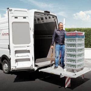 Palfinger Minifix ramp on cargo van with man operating lift.