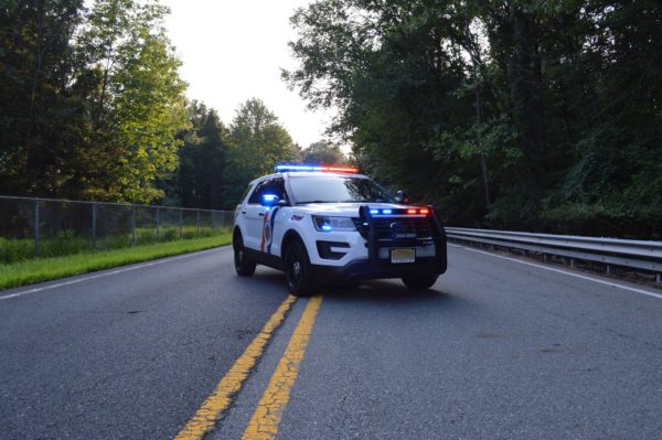 Police Vehicle Upfitted by American Trucks and Vans includes a Whelen Lightbar