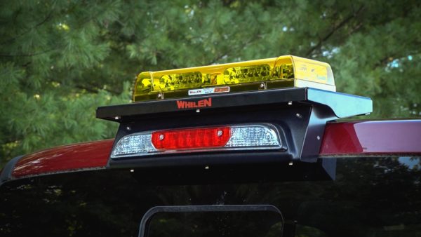 QuickFit™ Mounting System with Whelen emergency mini lightbar.