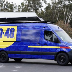 WD-40 work van with full vehicle wrap and custom exterior upgrades.