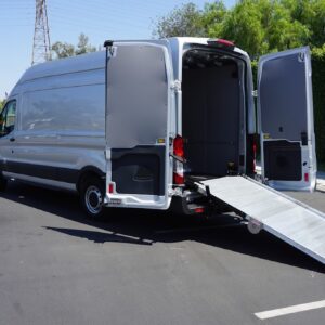 Extended fold-up ramp on large cargo van with open rear doors.