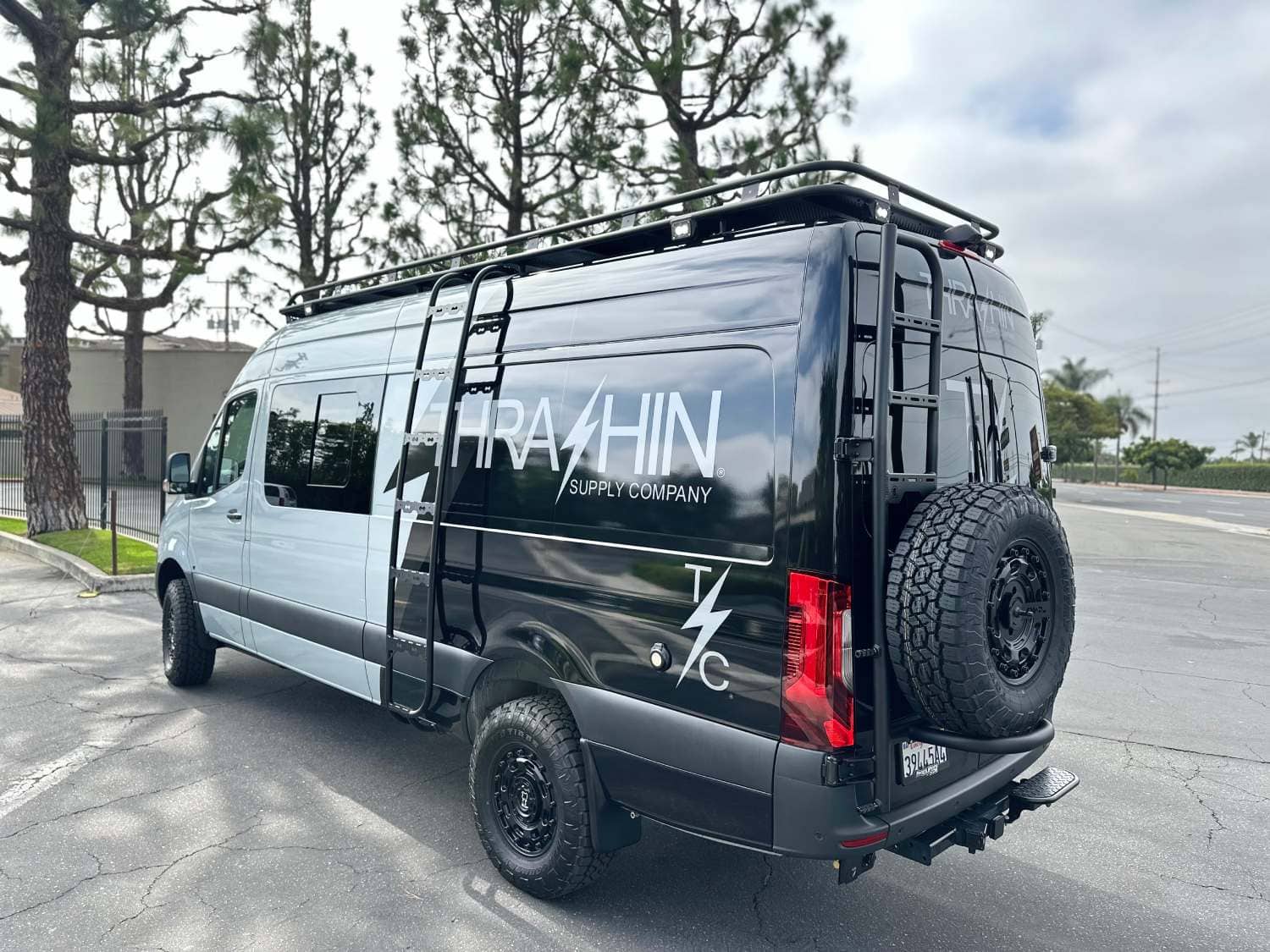 Recreational Adventure Van Motorcycle Hauler with Aluminess Racks and Ladders