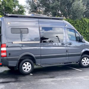 Sprinter Van with Fiamma F80S awning, Dometic roof-mounted air conditioner, and Sprinter Side Steps.
