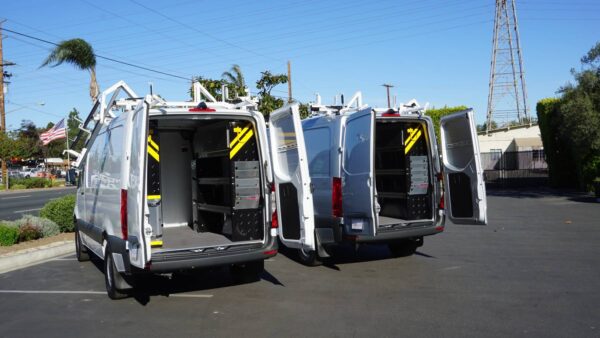 Ranger Design Shelving and Ladder Racks on Van Fleet Upfitted by American Trucks and Vans