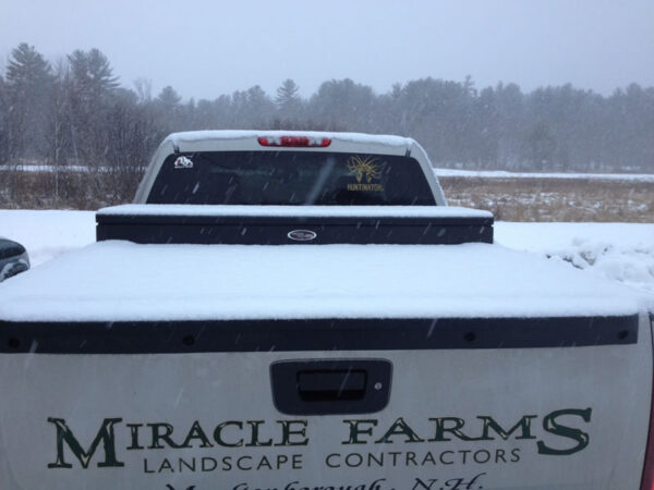 Snow Covered Work Truck with Protected Tools and Gear from Work Cover