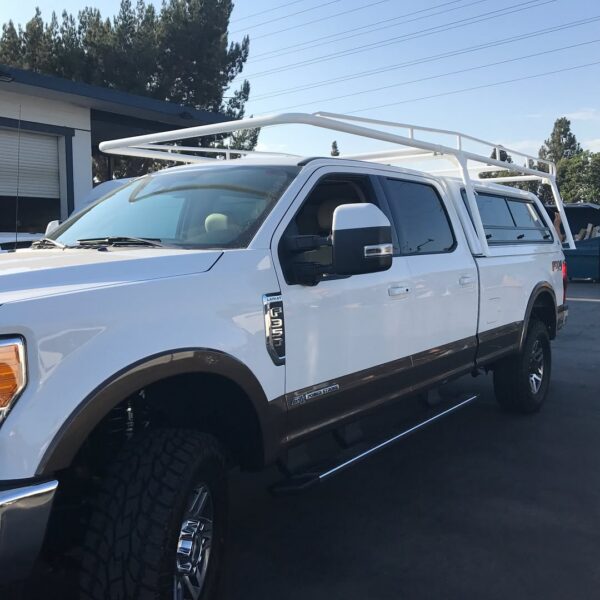 Black Maxx Truck Rack over Camper Shell Installed by American Trucks and Vans