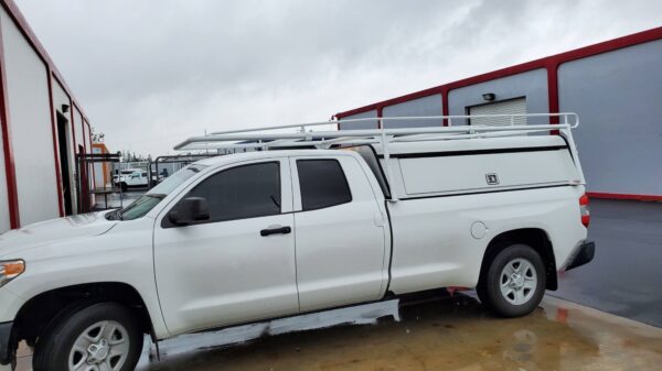 Toyota Tundra with Black Maxx Truck Rack over LEER Camper Shell
