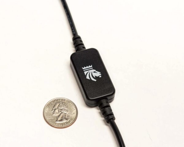 Kingpin Lighting dimmer switch for LED brightness control appearing next to quarter for scale