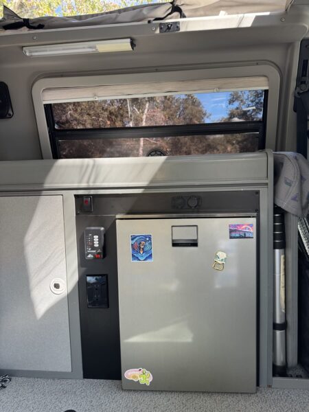 Indel B refrigerator, power outlet and electrical controls installed in a Volkswagen Eurovan